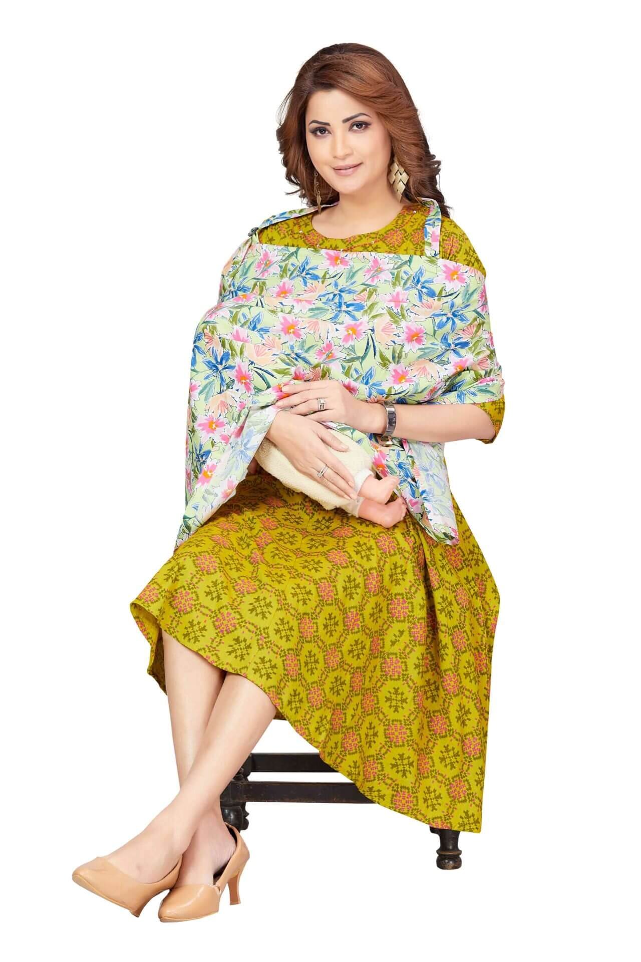 Mother wearing Babywish pastel floral cotton nursing cover during breastfeeding