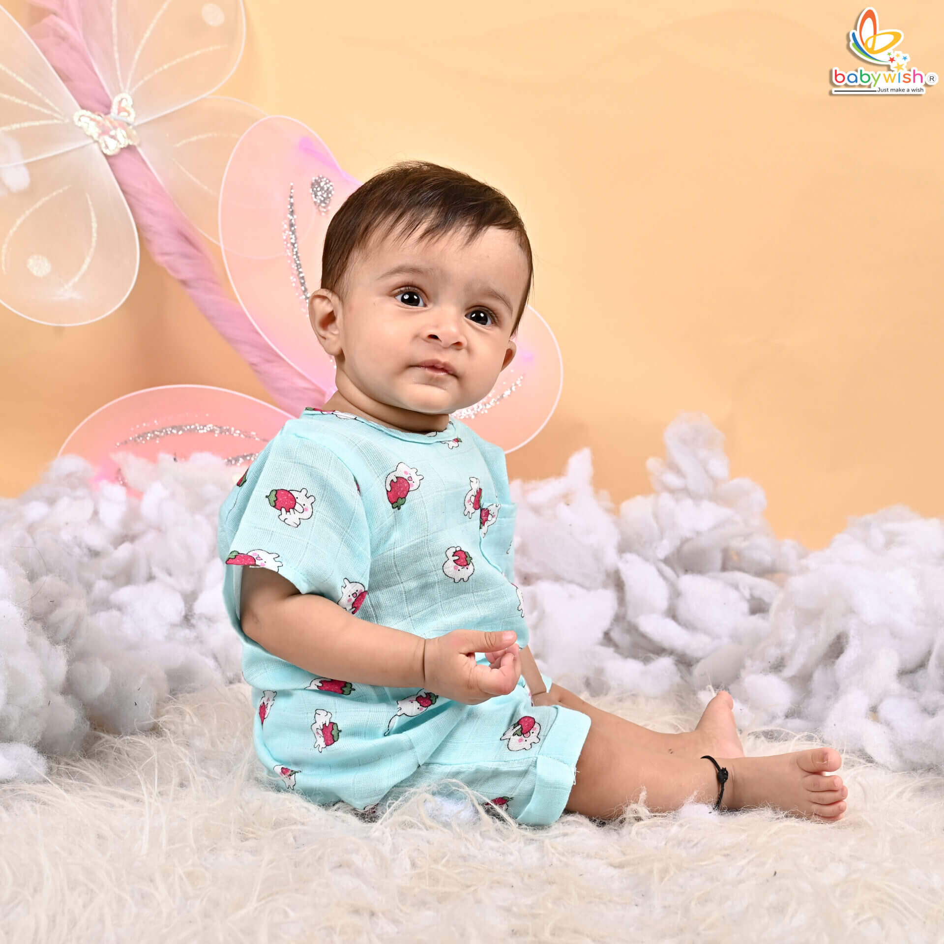 Baby wearing Babywish organic muslin jhabla top and shorts set
