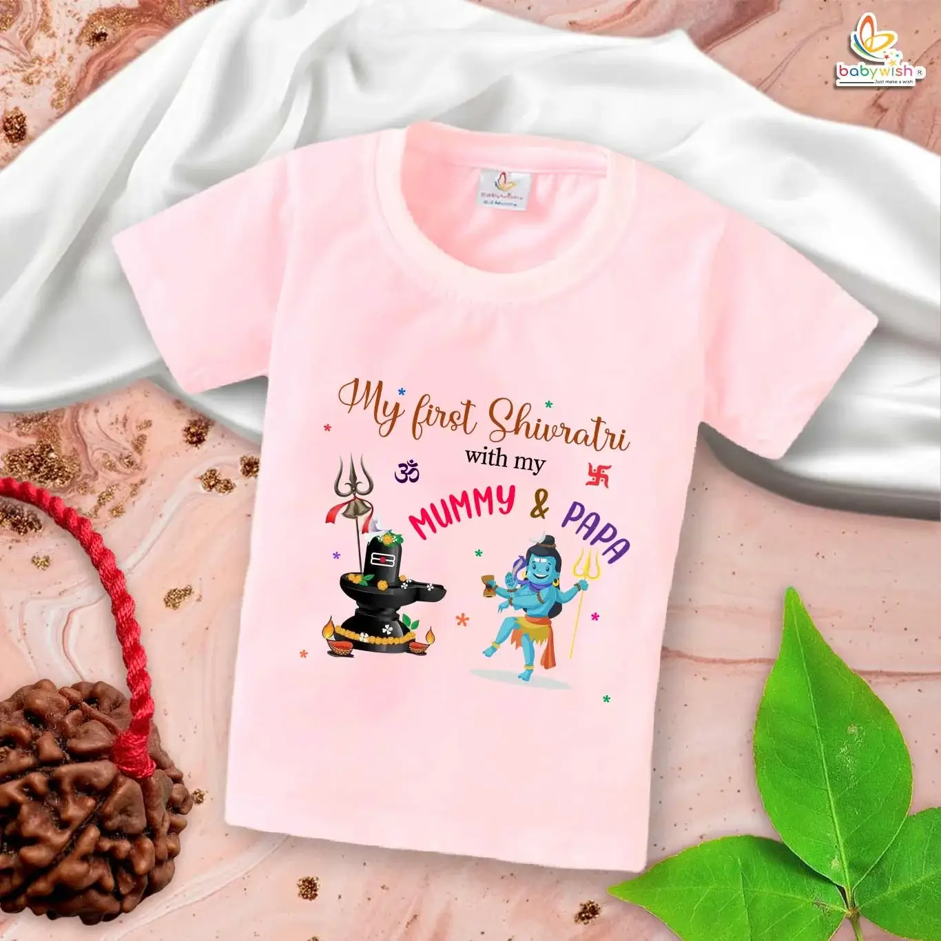 Adorable baby outfit for Mahashivratri celebration with parents